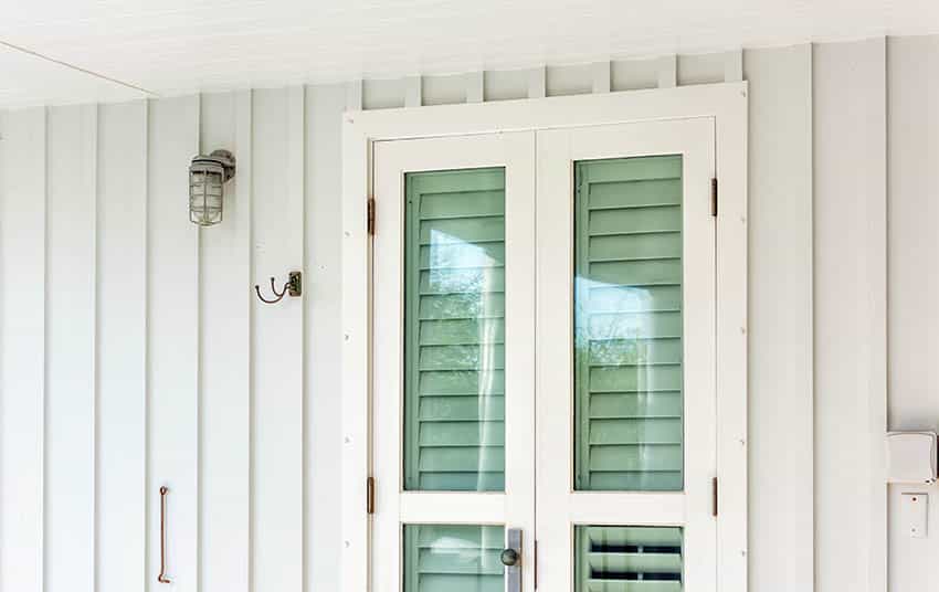 Glass french doors with shutters