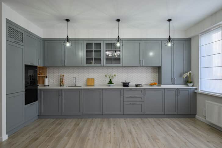 Thermofoil Cabinets Pros And Cons   Gray Cabinets With Thermofoil Wood Floors And Hanging Lights In Kitchen Is 728x485 