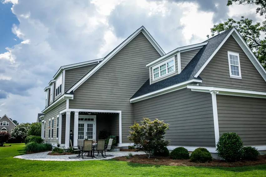 Gray house exterior clapboard siding dormer