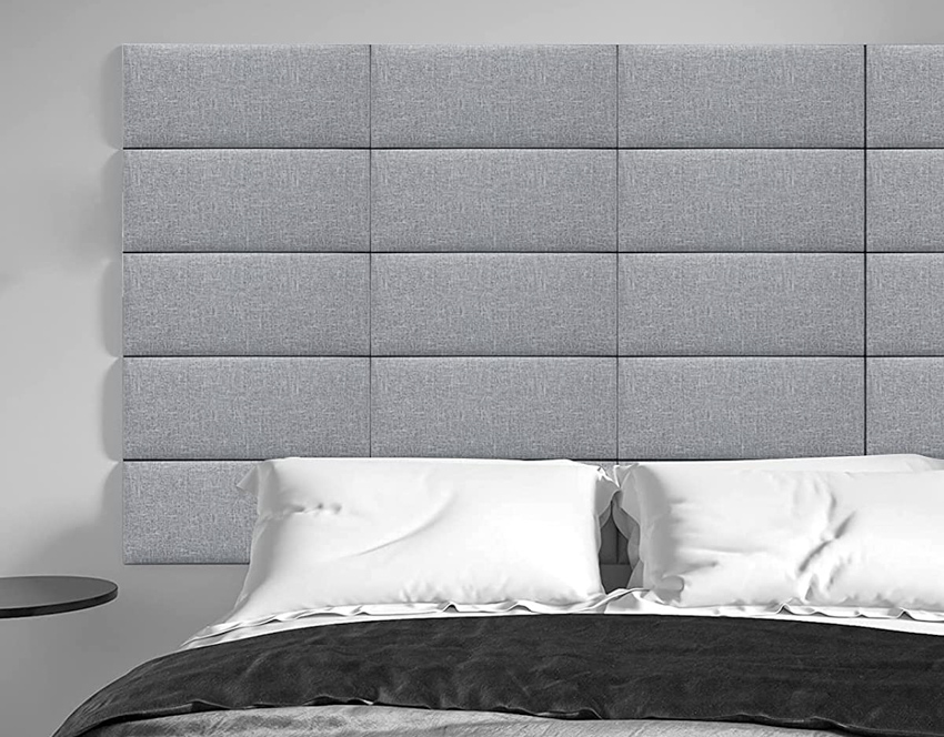 Gray padded headboard pillow bed