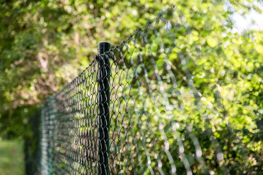 Woven wire type fence