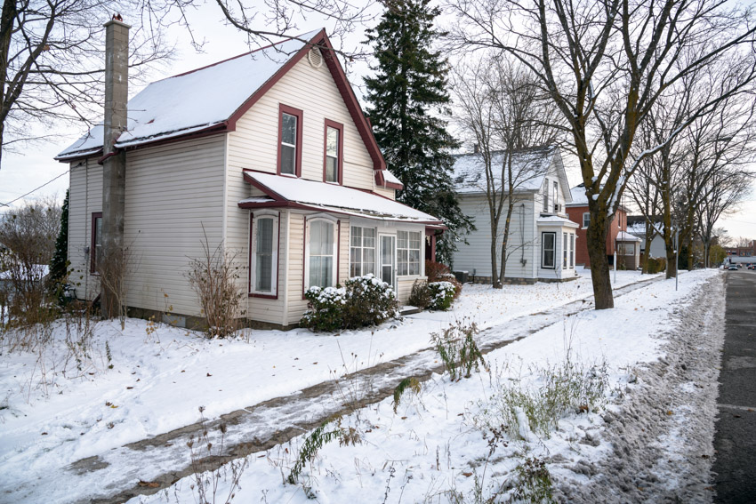 House design with porch enclosure prepared for winter
