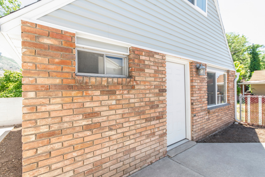 House exterior made of bricks and front door