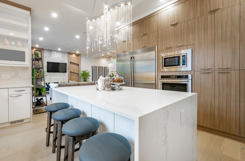 Kitchen design with woodlike thermofoil cabinets center island chandelier