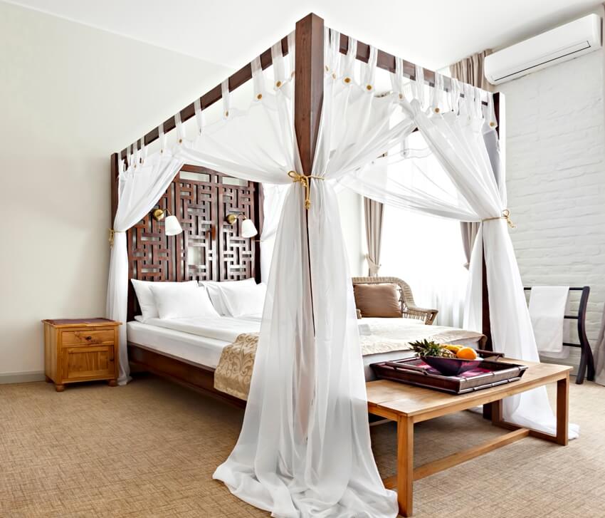 Luxurious modern bedroom interior with canopy bed