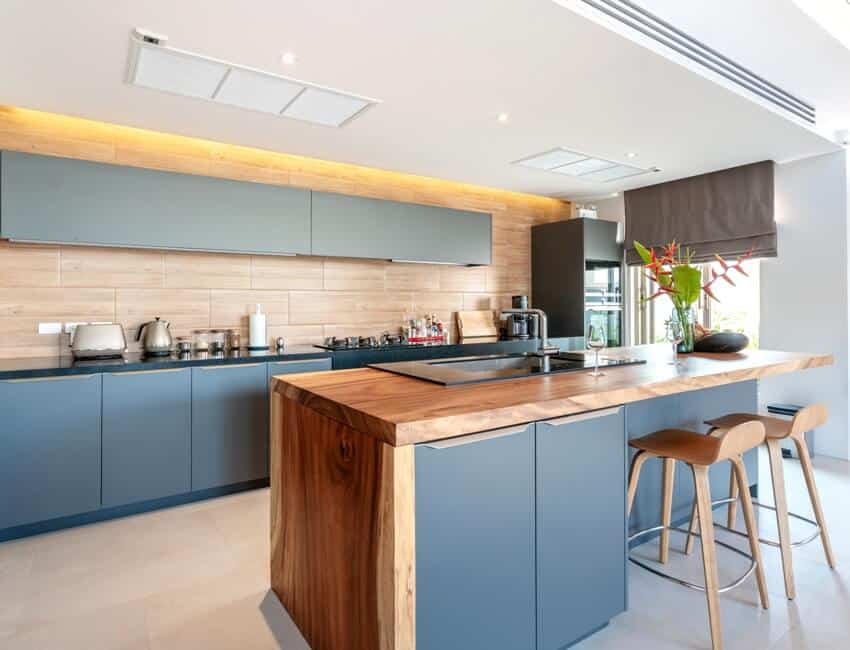 Luxury interior kitchen design area which feature island counter and built in furniture