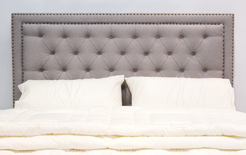 Luxury modern style bedroom and cozy bed with tufted headboard