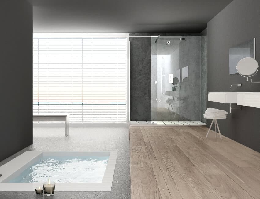 Minimalist white and gray bathroom with bath tub and panoramic window