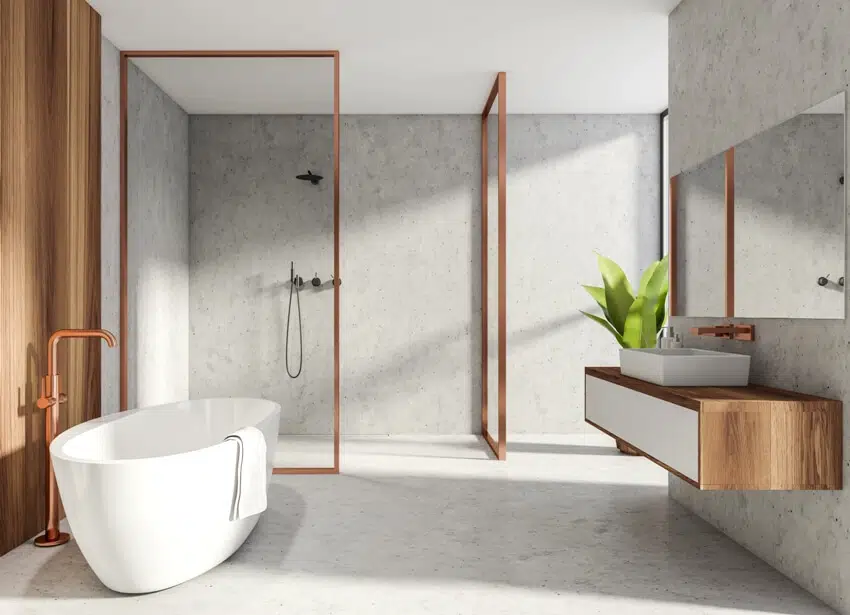 Minimalist bathroom interior with eco stucco shower walls sink with mirror and bathtub