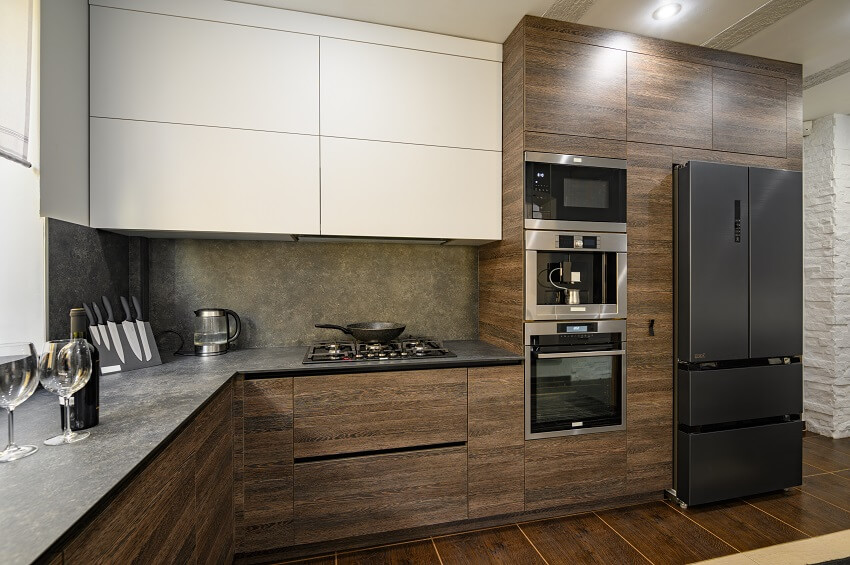 Modern large luxurious dark brown gray and black cozy kitchen interior