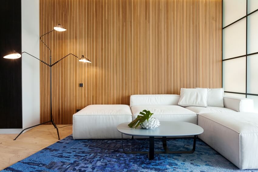 Modern living room with wooden panel wall