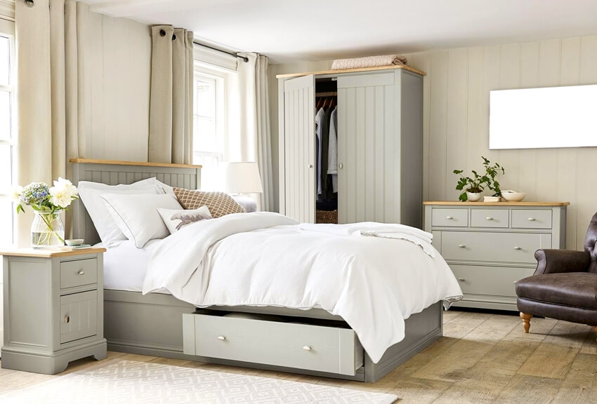 Master bedroom interior with gray bed and cabinets