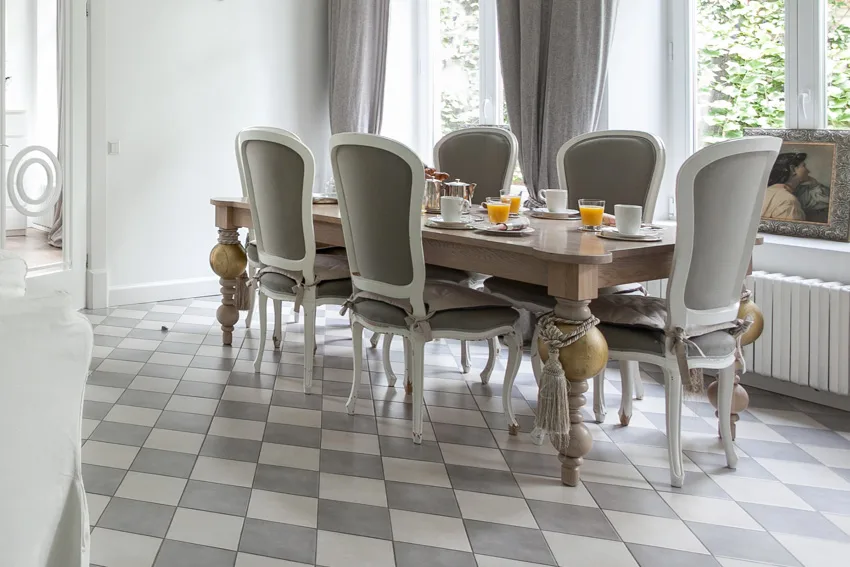 Fluted legs on table and patterned floor