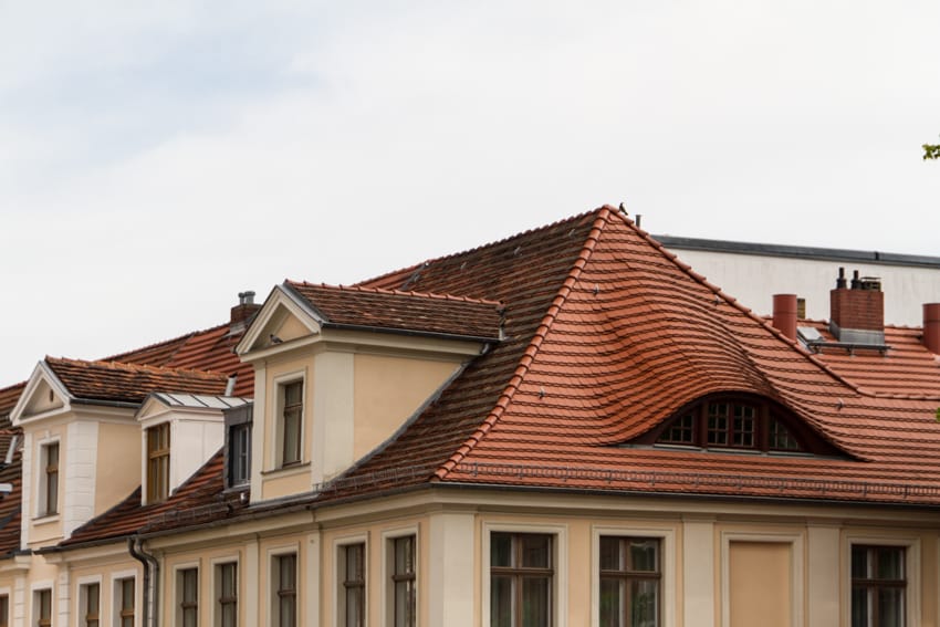 Roof with eyebrow dormer