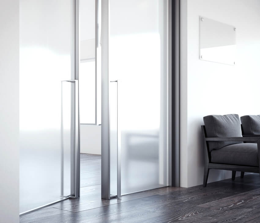 Signboard at the office with arm chairs and frosted glass 