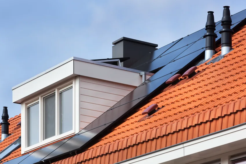 Small dormer orange roof solar panel