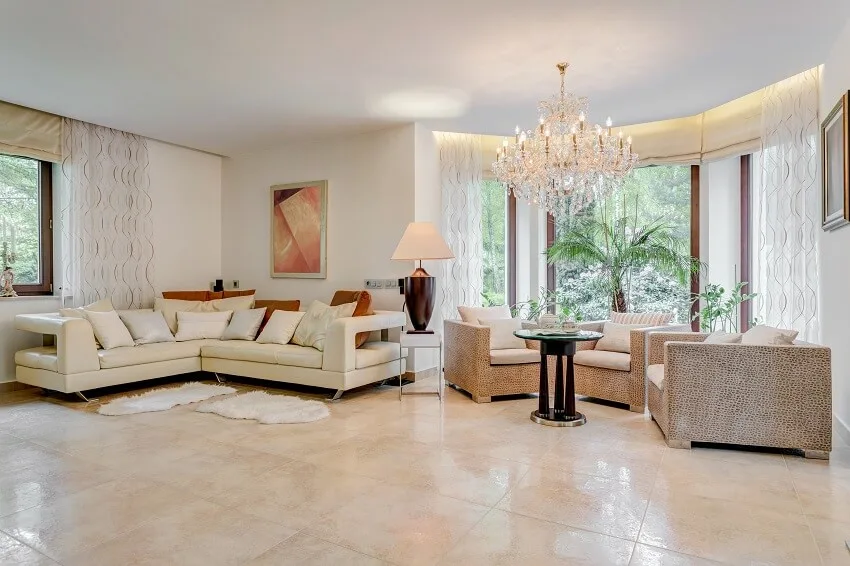 Spacious room designed in showy way with chandelier