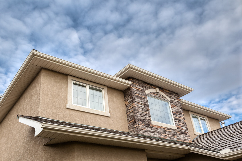 Stucco and brick exterior of house