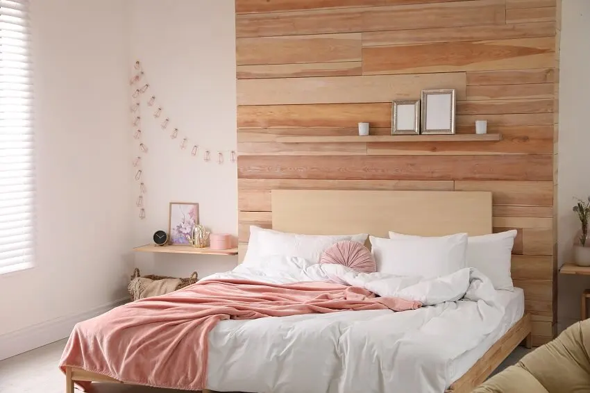 Stylish room interior with big comfortable bed
