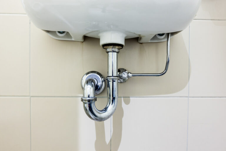 hiding pipes with a pedestal bathroom sink