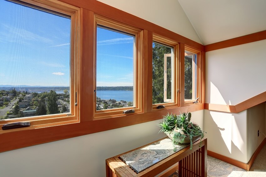 View of lake through windows of modern american home