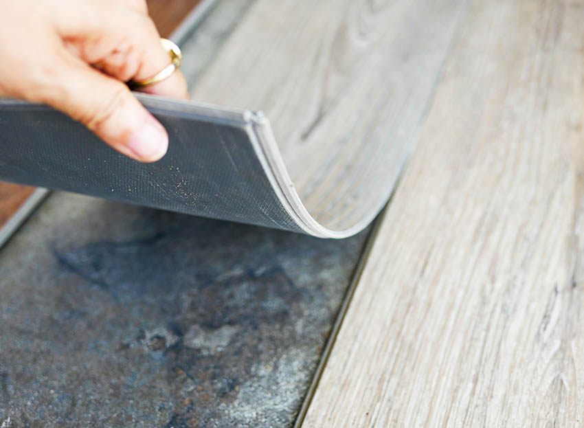 Wood look vinyl flooring with attached underlayment