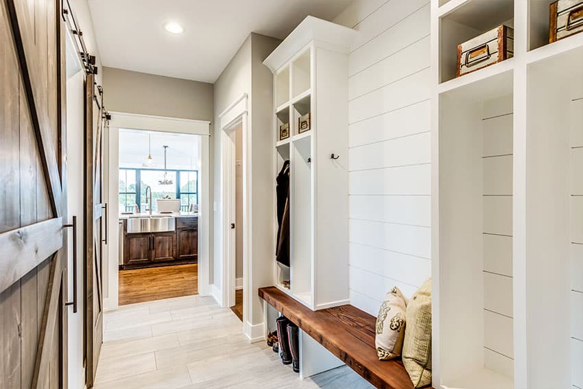 Entryway with white cabinet barn doors