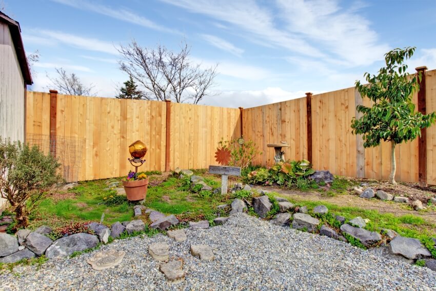 Backyard landscape design with shiplap fencing