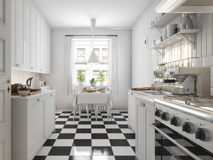 Farmhouse galley kitchen checkered flooring white wood cabinets dining space tile backsplash