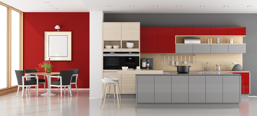 Kitchen and dining area with red and gray cabinets 
