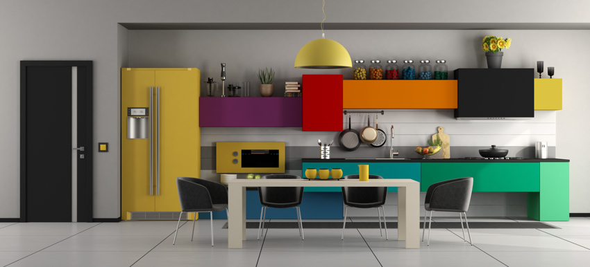 Kitchen with multi color cabinets hanging lights door tile floors table chairs