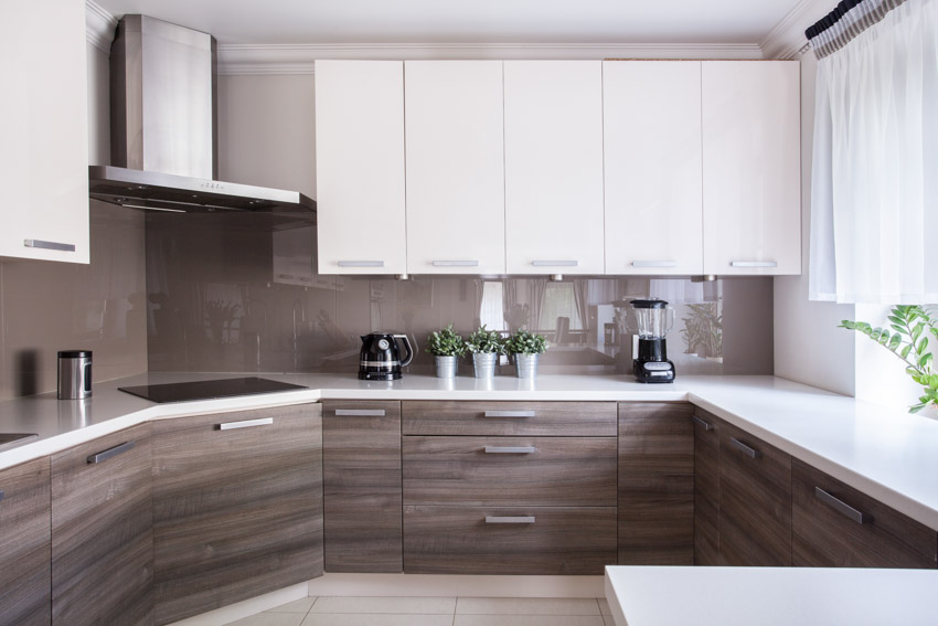 Kitchen with white and wood cupboards