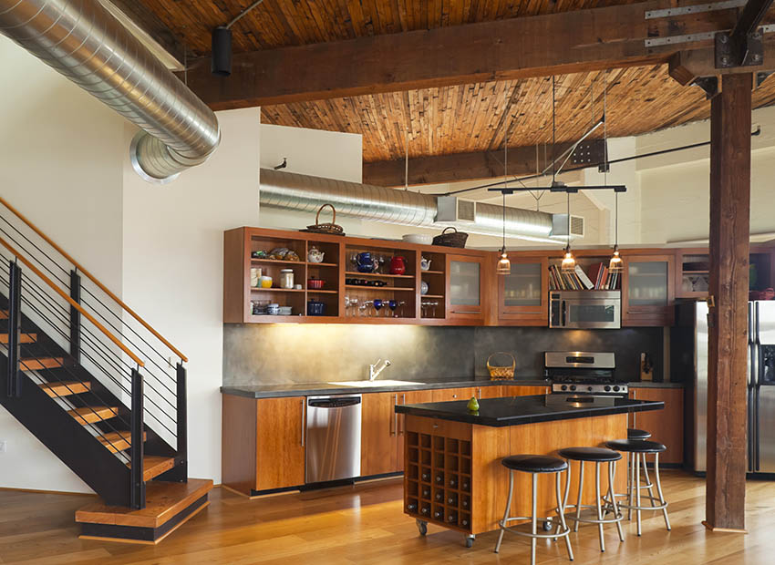 Loft post and beam kitchen with high ceilings open duct work