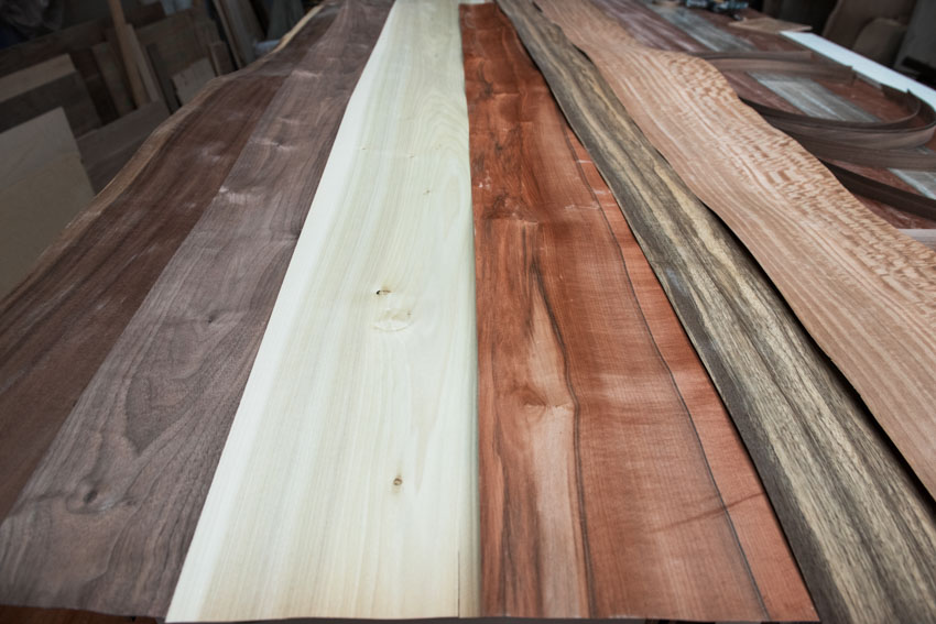 Long sheets of wood veneer with different colors