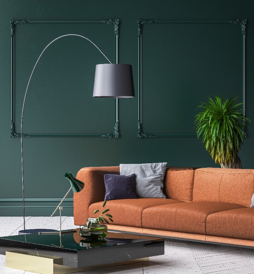 Modern dark green living room interior with white parquet floor brown sofa floor lamp and coffee table