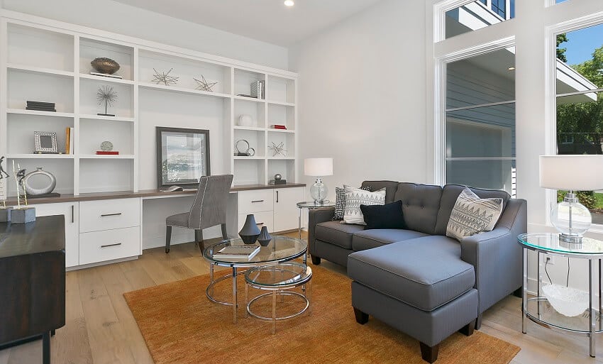 Modern home with glass tables and built in desk and shelves