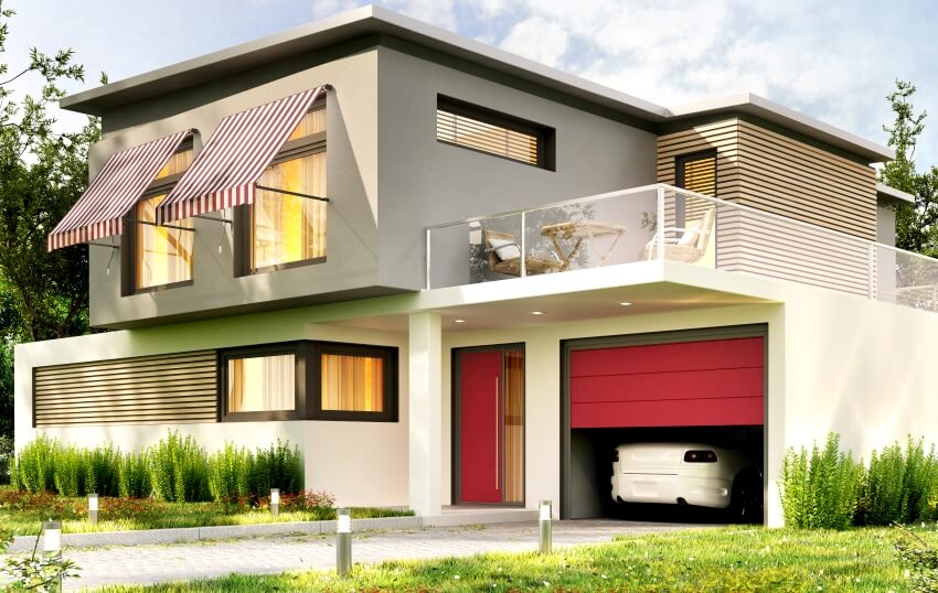 Modern home design with window awnings, garage and car
