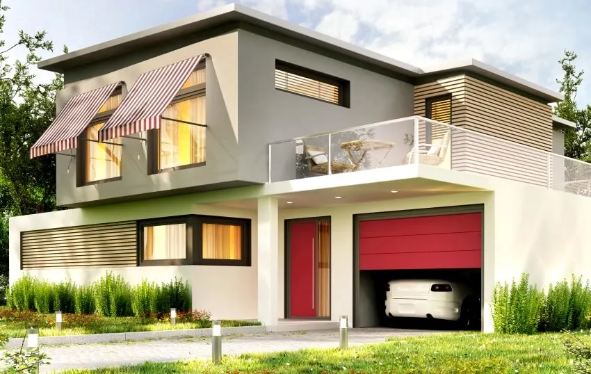 Modern home design with window awnings, garage and car 