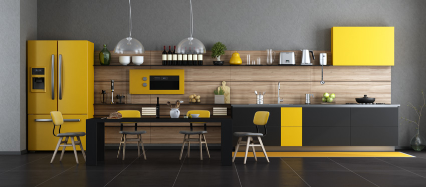 Modern kitchen with black and yellow cabinets wood backsplash appliances hanging lights