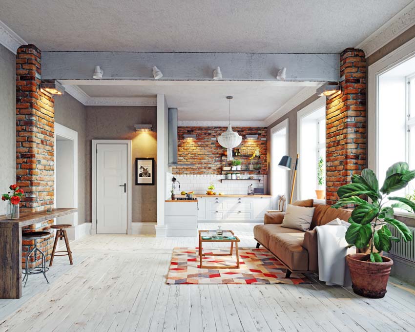 Modern living room white wood floor gray ceiling beam brick pillar couch windows