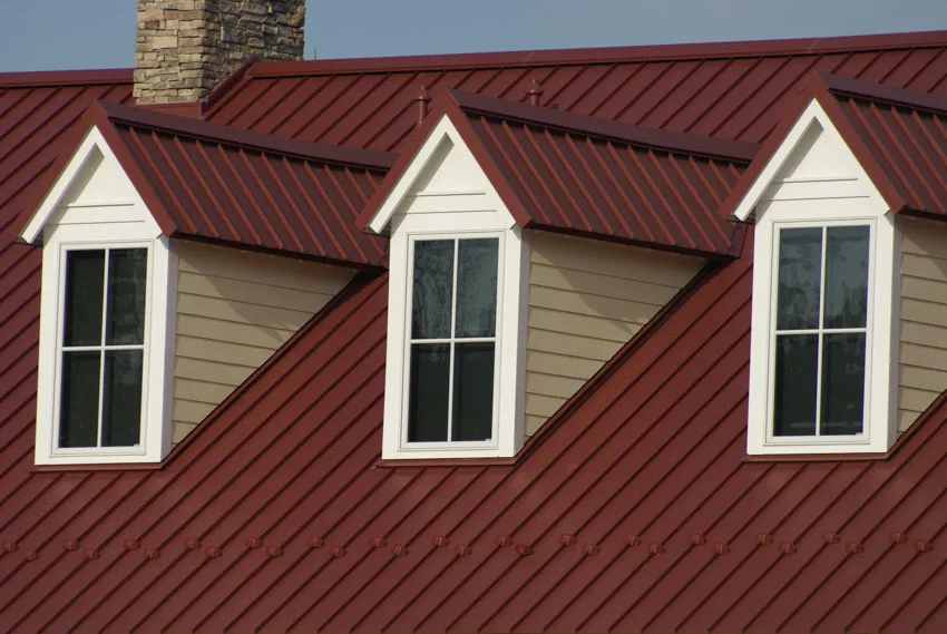 Red roof with white dormer windows