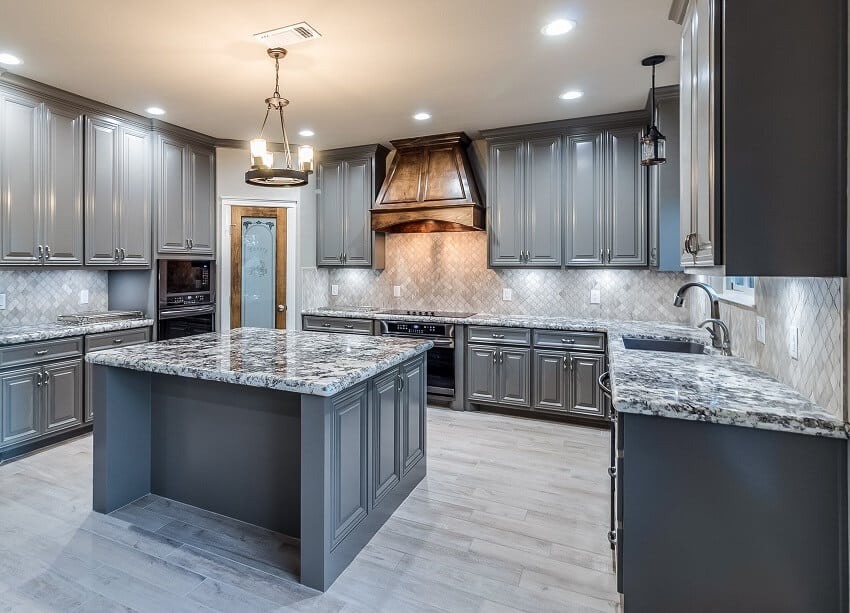 Stunning gray kitchen with island busy granite countertops and cabinets