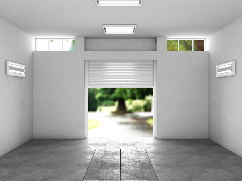 Trackless garage door concrete floor white walls