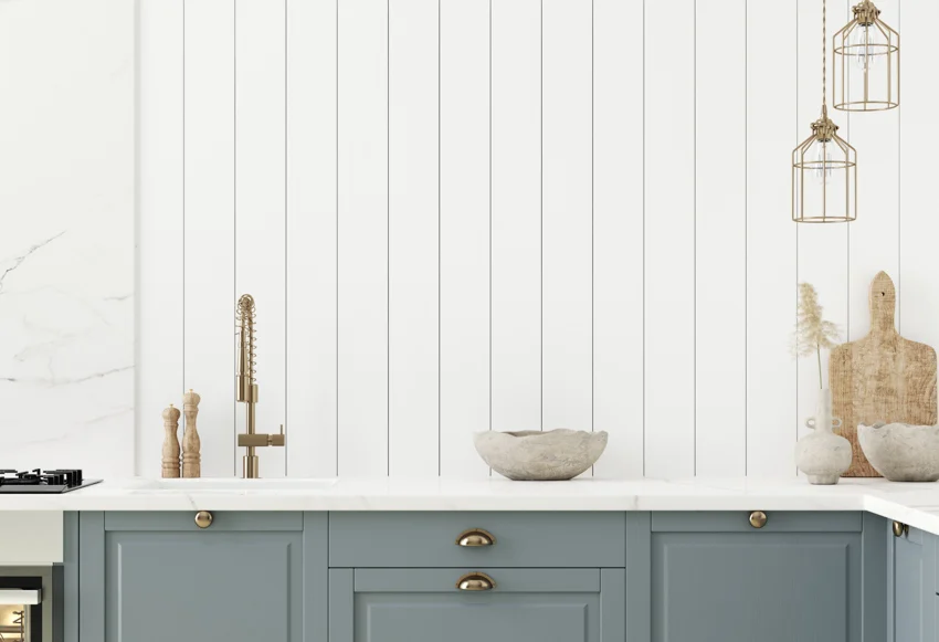 Vertical wood siding kitchen cabinets drawers countertop sink faucet