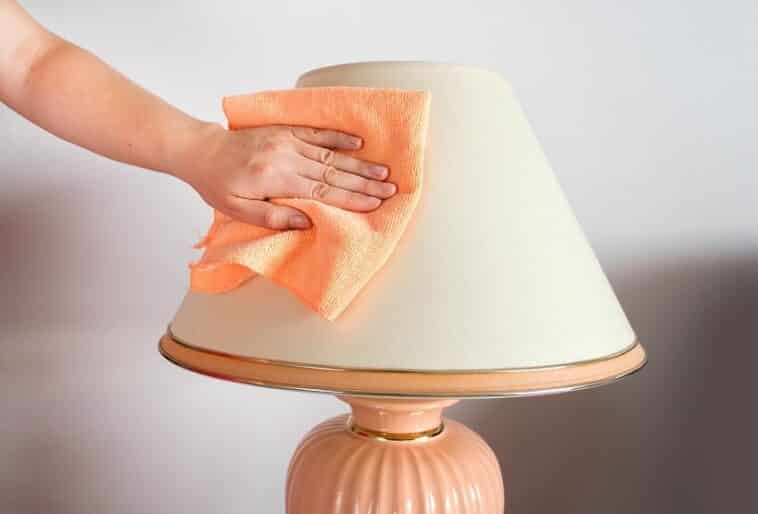 How To Clean Lamp Shades   Woman Cleaning The Lamp At Home Is 758x514 