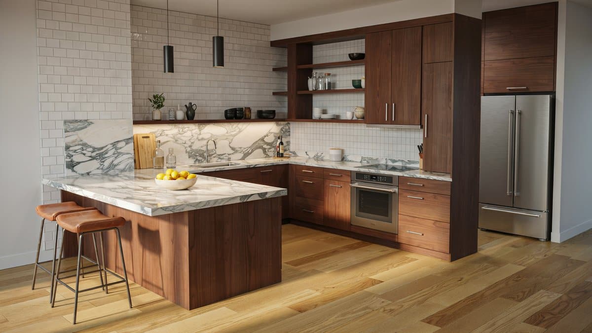 Dark wood cabinets paired with white Calacatta marble counters and subway tile