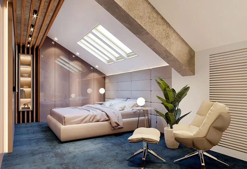 Bedroom with blue floor indoor plant recliner seat with ottoman skylight