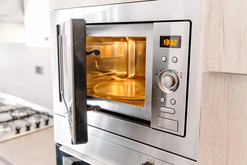 https://designingidea.com/wp-content/uploads/2021/12/Built-in-microwave-with-stainless-frame-is.jpg.webp