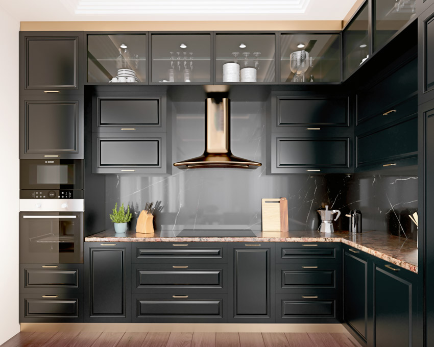 Black kitchen cabinets hood translucent countertop wood floor