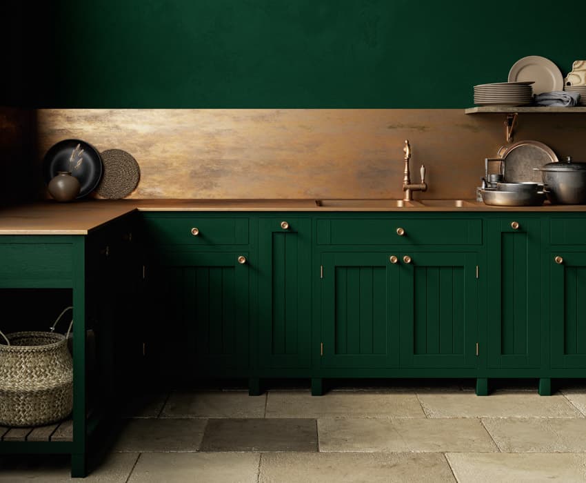 Brass kitchen countertop, green cabinets and brazz backsplash